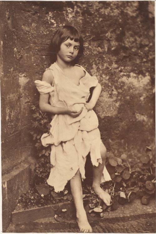 Alice Liddell (1852 - 1934), the inspiration for Lewis Carroll's fictional character Alice, posing in 1858.